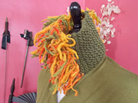 A pumpkin, yellow and olive cowl.